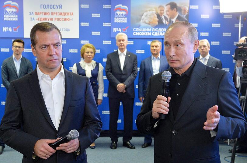 Putin (r) nannte das Ergebnis ein Zeichen "wachsender politischer Reife" der Russen. Foto: Alexei Druzhinin/Sputnik/Kremlin