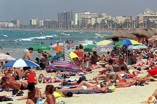 Urlauber am Strand