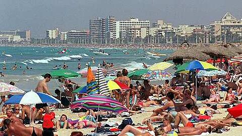 Urlauber am Strand