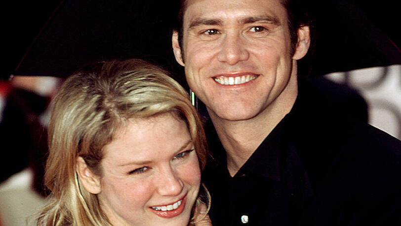 Jim Carrey und Renée Zellweger bei den Golden Globe Awards im Jahr 2000. Jim Carrey und Renée Zellweger bei den Golden Globe Awards im Jahr 2000.