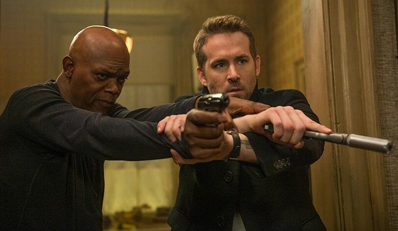 Früher war Darius Kincaid (Samuel L. Jackson, links) der größte Feind von Leibwächter Michael Bryce (Ryan Reynolds), inzwischen ist er sein Klient.