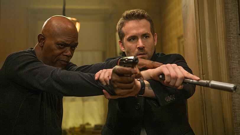 Früher war Darius Kincaid (Samuel L. Jackson, links) der größte Feind von Leibwächter Michael Bryce (Ryan Reynolds), inzwischen ist er sein Klient.