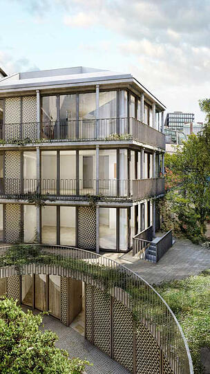 Die Bewohner der 24 luxuriösen Appartements können dem Lärm der Straßen entfliehen, wenn sie in den Hinterhof schauen.
