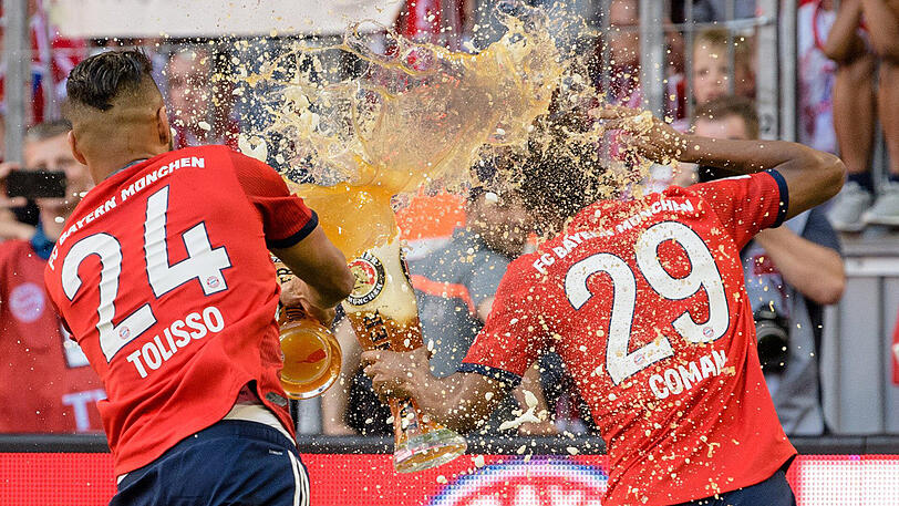 Im Weißbierduell: Corentin Tolisso und Kingsley Coman.