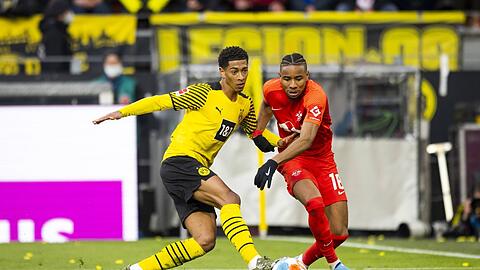 Einst Gegener in der Bundesliga, nun bei Real Madrid und Chelsea: Jude Bellingham (l.) und Christopher Nkunku.