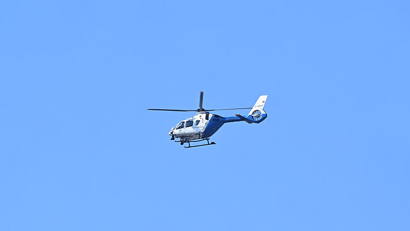 Ein Polizeihubschrauber kreist über der Bayerischen Landeshauptstadt. Ein Polizeihubschrauber kreist über der Bayerischen Landeshauptstadt.