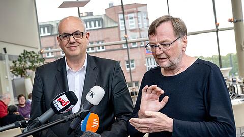 Bremens Bürgermeister Andreas Bovenschulte und Reinhold Wetjen, Landesvorsitzender der SPD Bremen.