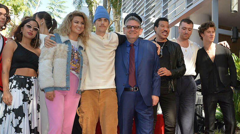 Sir Lucian Grainge wird von den Musik-Stars gefeiert.