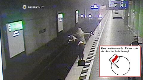 Durch Warnzeichen konnten diese beiden unbekannten Frauen den einfahrenden S-Bahn-Fahrer rechtzeitig warnen.