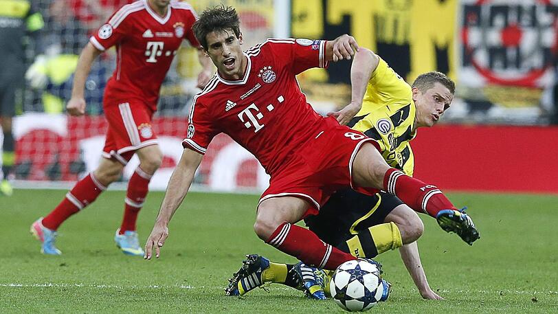 War das was?  Javi Martínez (l.) erinnert sich nicht mehr genau an das Finale 2013 der Champions League. Zur Erinnerung: Die Bayern haben gegen den BVB in Wembley gewonnen.