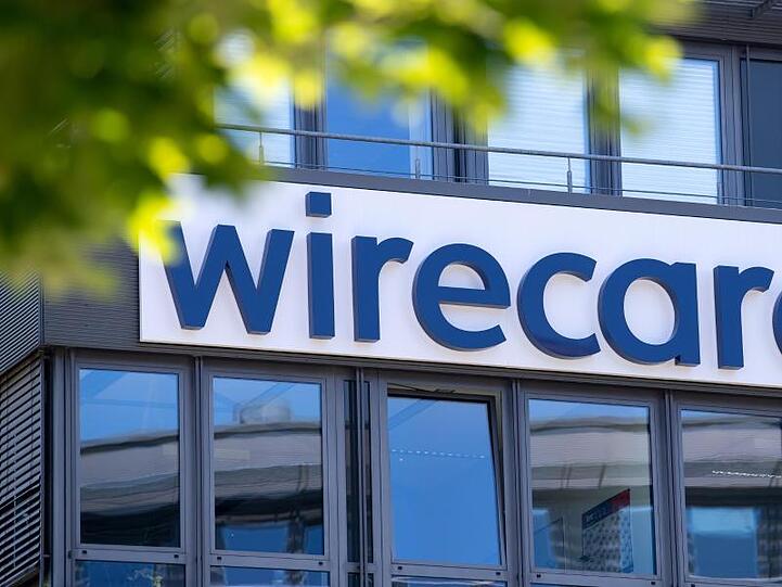 Der Schriftzug von Wirecard an der Firmenzentrale des Zahlungsdienstleisters in Aschheim. Foto: Sven Hoppe/dpa