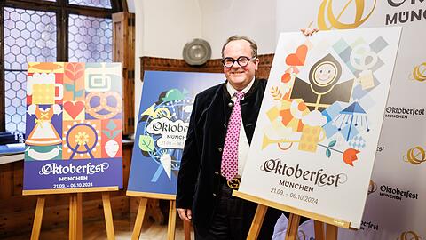 "Unser Siegerentwurf verkörpert Tradition und Modernität der Wiesn": Wiesn-Chef Clemens Baumgärtner neben dem Motiv (rechts) von Annika Mittelmeier.