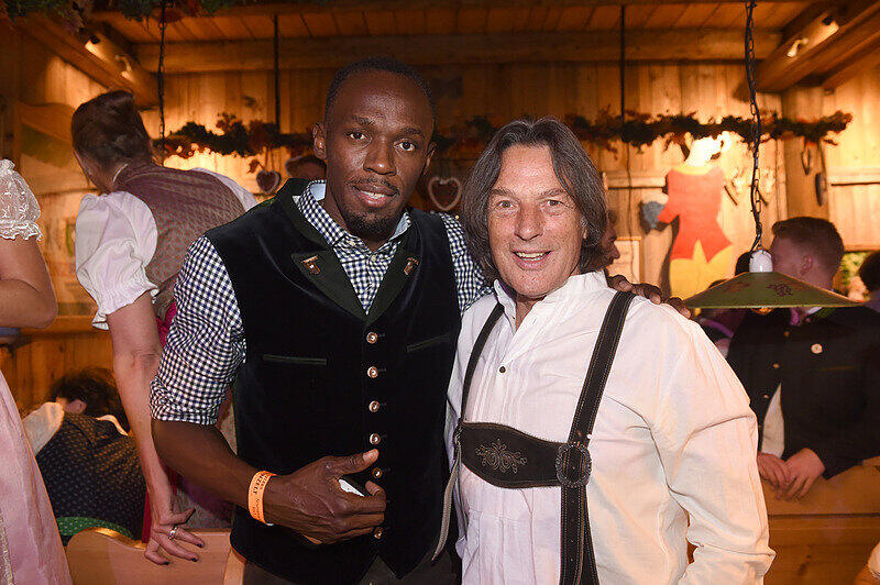 Sprint-Star Usain Bolt (Hier mit Sportler-Doc Hans-Wilhelm Müller-Wohlfahrt) ist riesiger Wiesn-Fan. Er kam gleich mehrfach dieses Jahr.