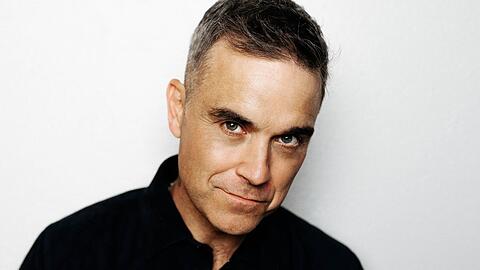 Robbie Williams feiert 25 Jahre Solokarriere unter anderem mit einem neuen Song.
