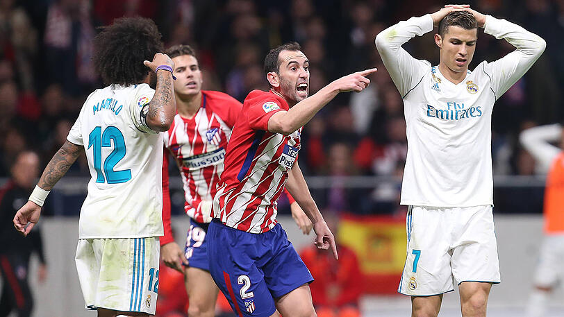 Real-Star Cristiano Ronaldo (rechts) muss zusehen, wie Atlético Madrid nach dem Derby jubelt.