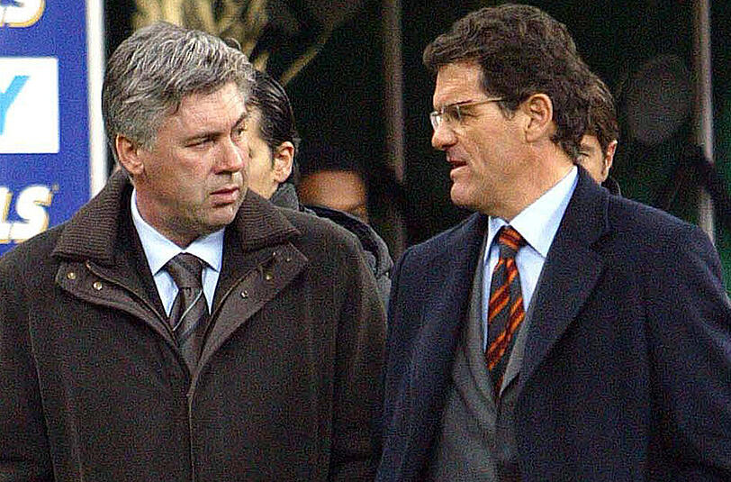 Sie kennen sich schon sehr lange: Carlo Ancelotti (links) 2004 als Trainer des AS Rom und Fabio Capello als Trainer des AC Mailand.