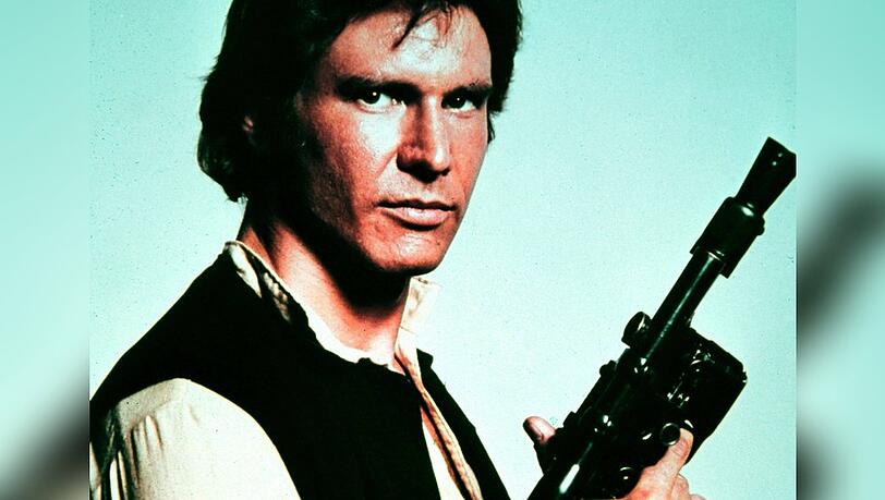 In "Krieg der Sterne" schwört der von Harrison Ford gespielte Schmuggler Han Solo auf seine treue Blaster-Pistole.