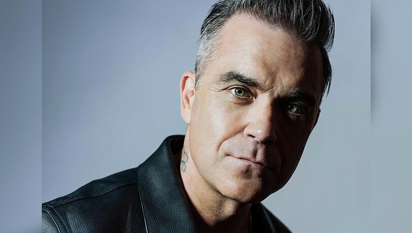 Robbie Williams blickt auf 25 Jahre Solokarriere zurück.