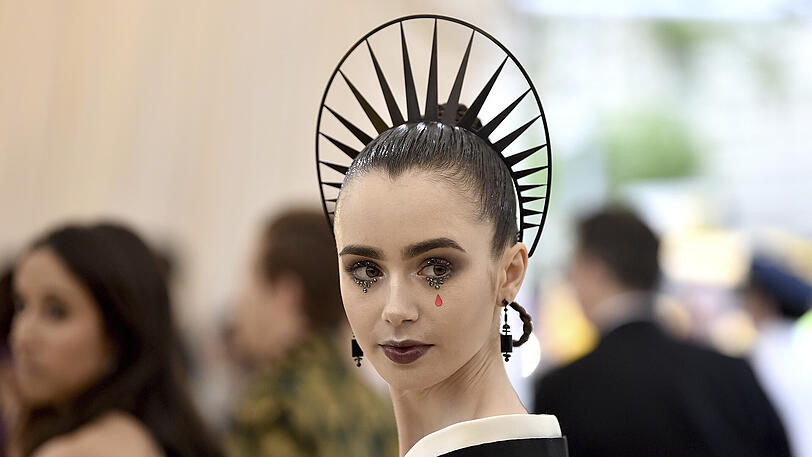 Lily Collins.
