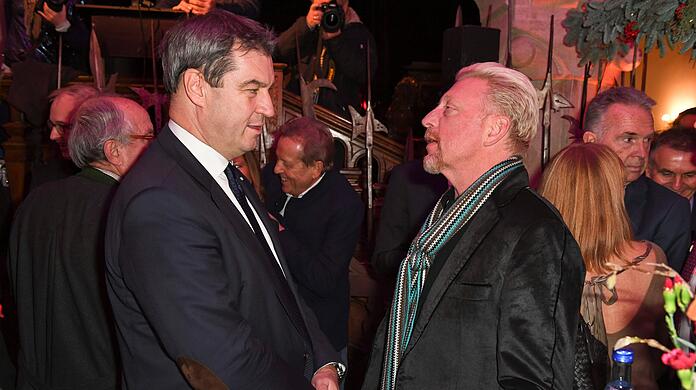 Ministerpräsident Markus Söder und Boris Becker
bei einer Feier 2018: Wird es bald ein gemeinsames Tennismatch der beiden geben?