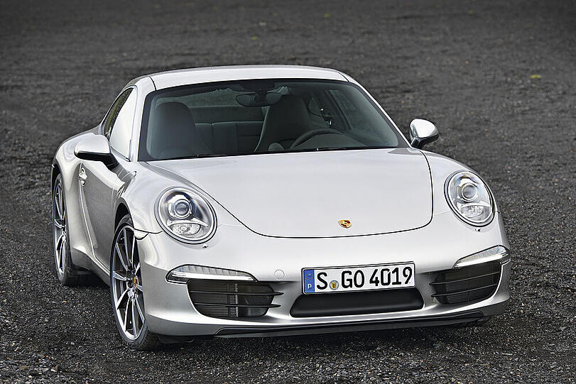 Neuauflage eines Klassikers: Die nächste Generation des Porsche 911 feiert auf der IAA im September Premiere und kommt Anfang Dezember zu Preisen ab 88 037 Euro in den Handel.