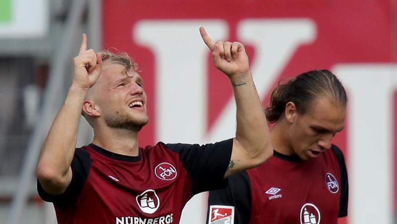 Der Nürnberger Johannes Geis (l) jubelt neben Michael Frey über seinen Treffer zum 1:0. Foto: Daniel Karmann Der Nürnberger Johannes Geis (l) jubelt neben Michael Frey über seinen Treffer zum 1:0. Foto: Daniel Karmann