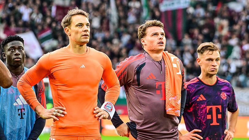 Manuel Neuer (l.) und sein designierter Nachfolger Jonas Urbig:  Beim FC Bayern tickt die Uhr f&uuml;r den verletzten Kapit&auml;n, w&auml;hrend der junge Kronprinz Erfahrung sammelt.