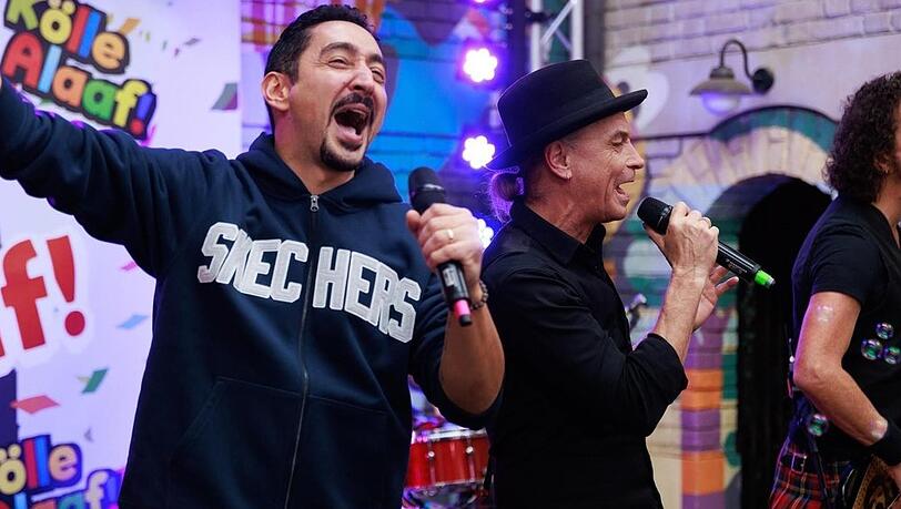 K&ouml;lner Musikgr&ouml;&szlig;en Eko Fresh (l.) und Brings in der RTL-Daily "Unter uns".