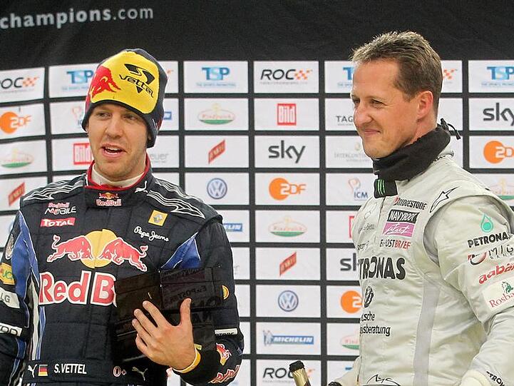 Weltmeister Sebastian Vettel und Rekordchampion Michael Schumacher.