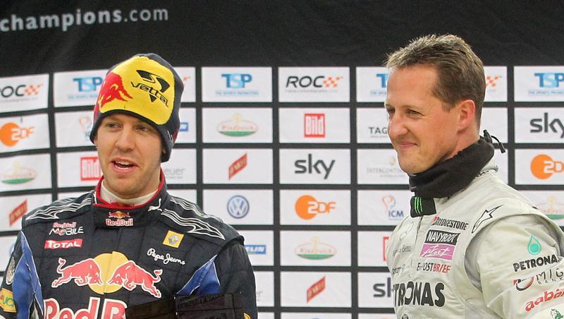 Weltmeister Sebastian Vettel und Rekordchampion Michael Schumacher. Weltmeister Sebastian Vettel und Rekordchampion Michael Schumacher.