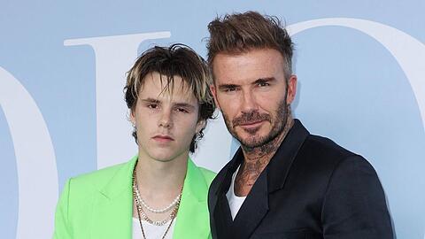 Teilen ihre Leidenschaft für Mode: Cruz Beckham und sein Vater David Beckham im Sommer bei der Dior Fashion Show in Paris.