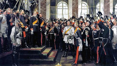 Reichsgründung ohne den bayerischen König: Das Gemälde des Historienmalers Anton von Werner zeigt das Hoch des Großherzogs von Baden auf den neuen Kaiser. Auf dem Podium hinter Wilhelm I. stehen die Bundesfürsten, davor Offiziere und der Kanzler Otto von Bismarck (in weißer Uniform).