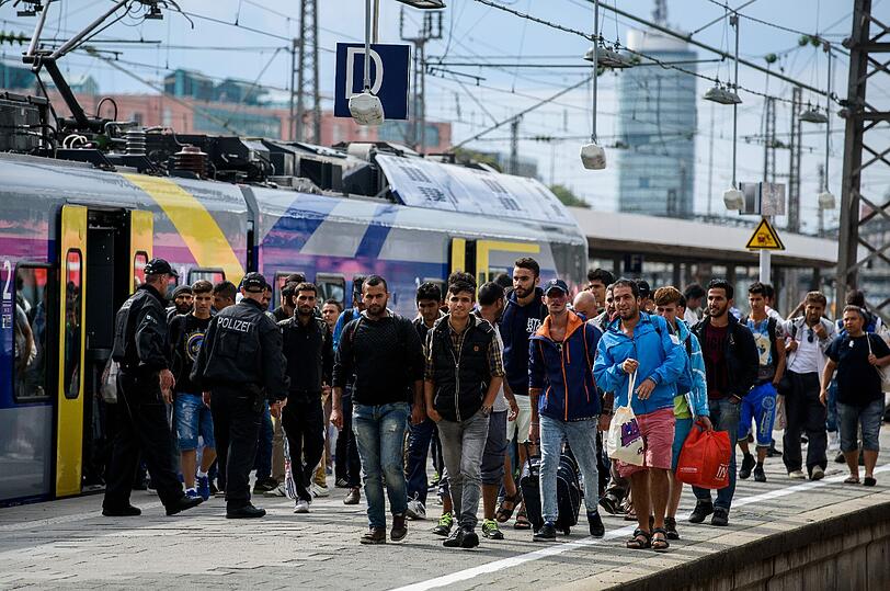 Flüchtlinge kommen am Hauptbahnhof München an.