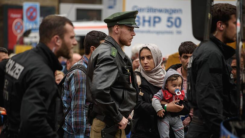 Flüchtlinge kommen am Hauptbahnhof München an. Flüchtlinge kommen am Hauptbahnhof München an.