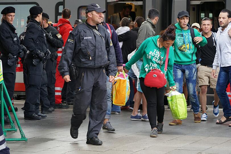 Flüchtlinge kommen am Hauptbahnhof München an.