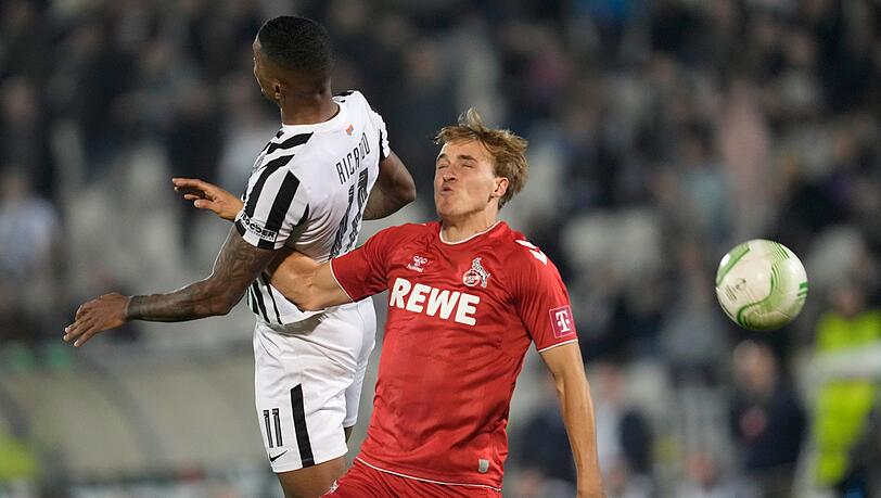 Ricardo Gomes (l) steuerte ein Tor zum Sieg von Partizan Belgrad gegen Timo Hübers und den 1. FC Köln bei.