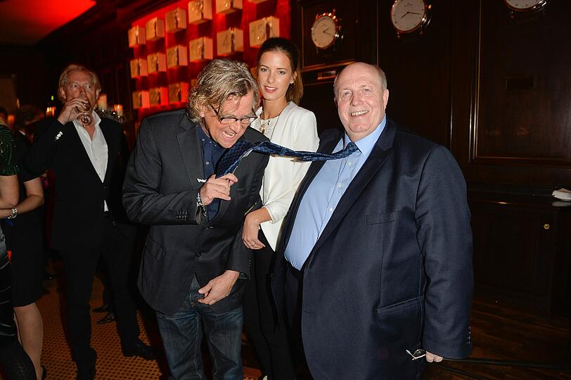 Martin Krug und Julia Trainer mit Reiner Calmund