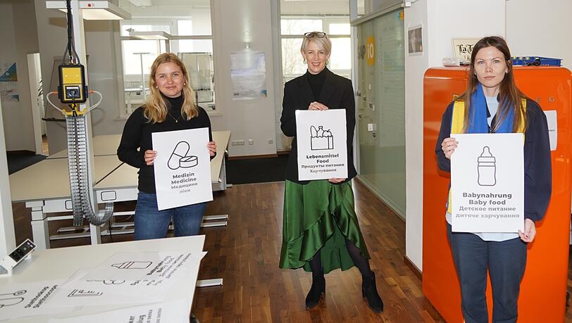 In Celine Hertels (l.) Büro bei SAP sammelt Anna Rai (r.) Hilfsgüter. Bürgermeisterin Katrin Habenschaden half bei der Standortsuche.