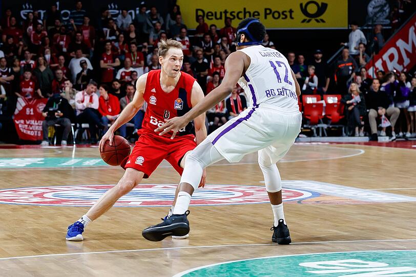 Petteri Koponen  (l.) war mit 14 Punkten Topscorer bei den Münchnern.