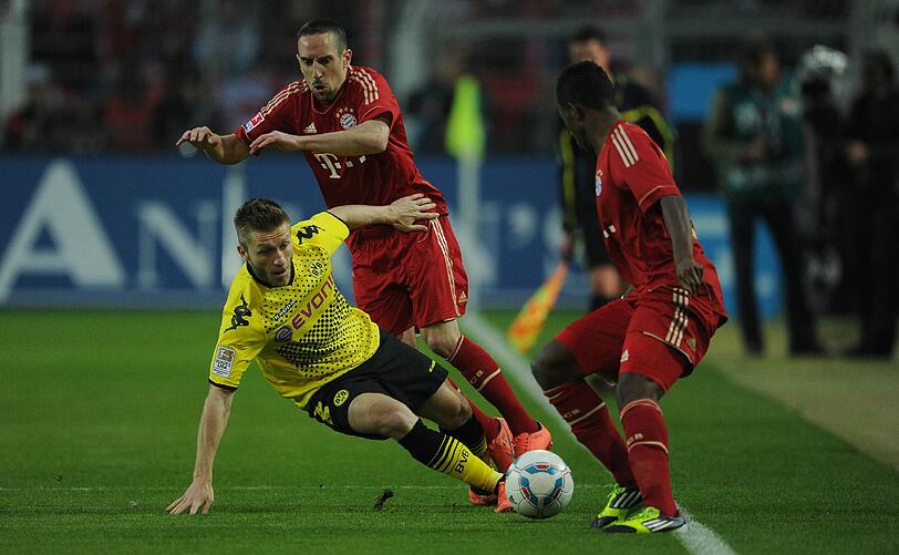 Es war das mit Spannung erwartete Gigantenduell, das vorgezogene Finale der Bundesliga - Dortmund gegen Bayern: die Bilder vom Spiel.