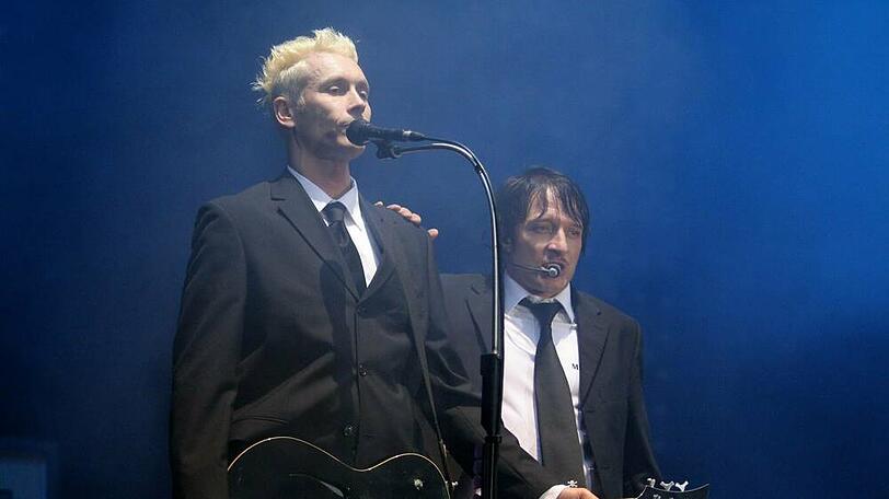 Farin Urlaub (l.) und Bela B. von Die Ärzte während eines Auftritts beim legendären Festival Rock am Ring.