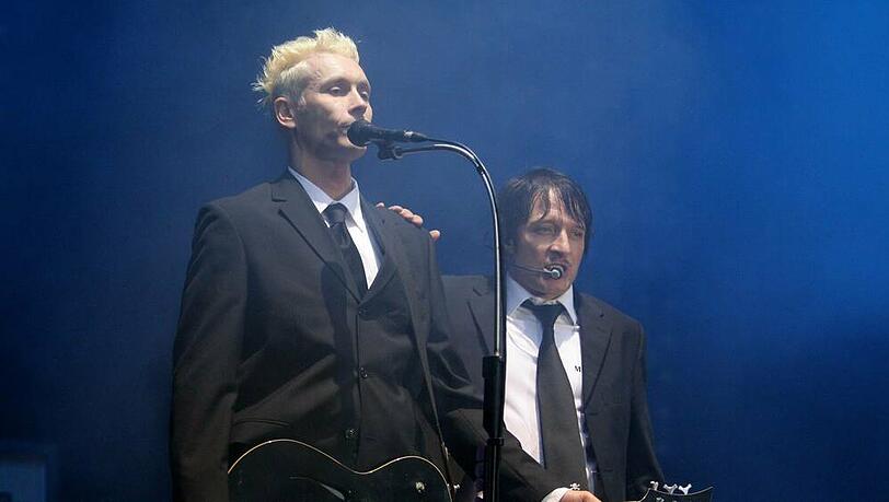 Farin Urlaub (l.) und Bela B. von Die Ärzte während eines Auftritts beim legendären Festival Rock am Ring. Farin Urlaub (l.) und Bela B. von Die Ärzte während eines Auftritts beim legendären Festival Rock am Ring.