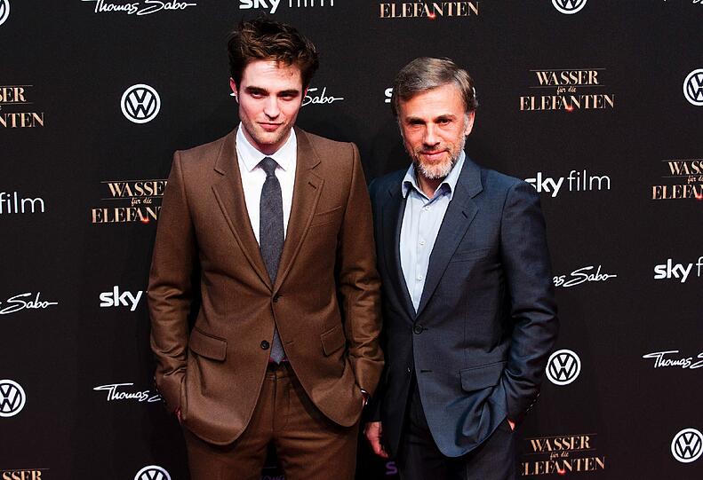 Zwei Herren im feinen Zwirn: Robert Pattinson und Christoph Waltz.
