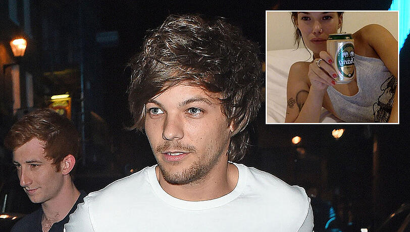 Auf dem Glastonbury-Festival konnte "One Direction"-Sänger Louis Tomlinson seine Hände nicht von Model Tamara Bell lassen.