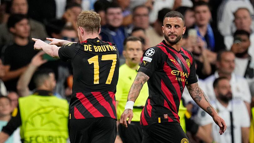 Kevin De Bruyne (l) traf für Man City zum 1:1 in Madrid.