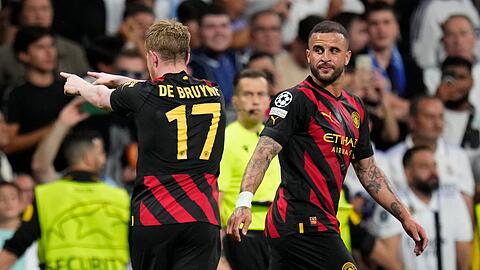 Kevin De Bruyne (l) traf für Man City zum 1:1 in Madrid.