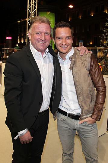 Der ehemalige Fußballspieler Andi Brehme und DTM-Fahrer Timo Scheider