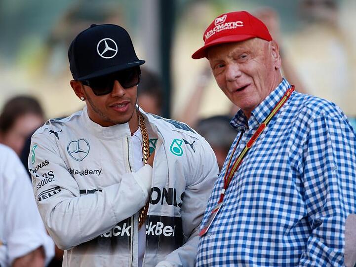 Hamilton (l) und Niki Lauda arbeiteten bei Mercedes eng zusammen.