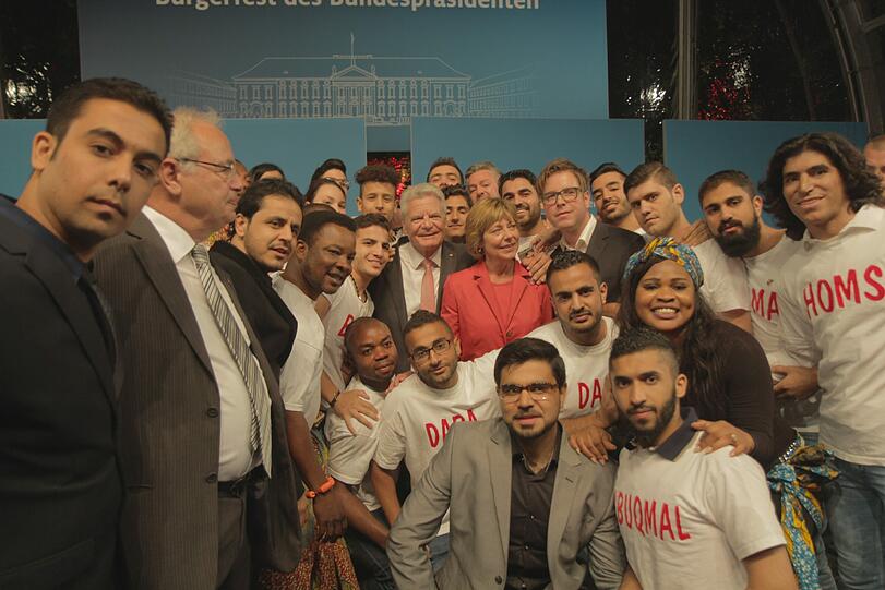 Mit anderen Flüchtlingen beim Bundespräsidenten.