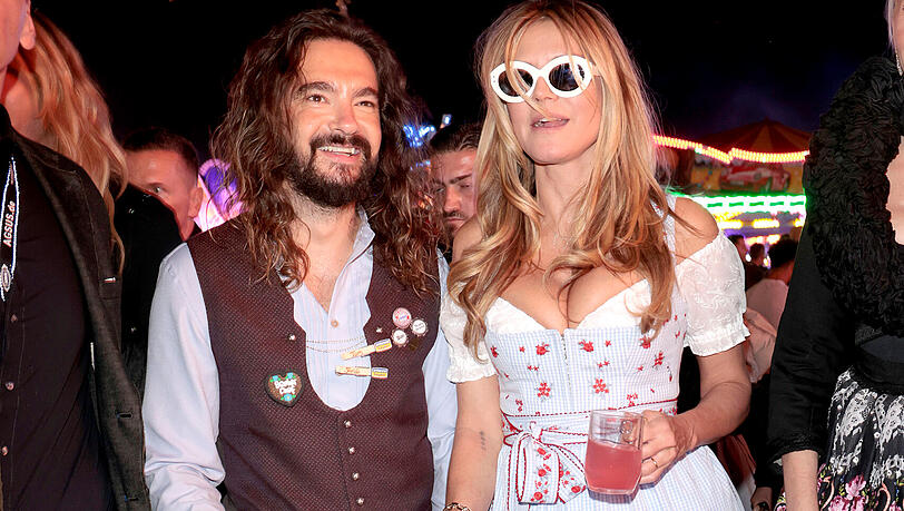 Tom Kaulitz und Heidi Klum: Tom hat alles richtig gemacht. Die Trendweste "Miesbacher" mit wei&szlig;em Hemd, Lederhose, Kniestr&uuml;mpfen, Haferlschuhen und als i-T&uuml;pfelchen ein Charivari. Bravo. Heidi bekommt f&uuml;r ihr Dirndl und die farblich abgestimmten Accessoires definitiv ein Foto. Einen kleinen Punktabzug gibt es f&uuml;r die Carmenbluse, die Trachtler so gar nicht m&ouml;gen.&nbsp;Aber sie ist definitiv eine Runde weiter.